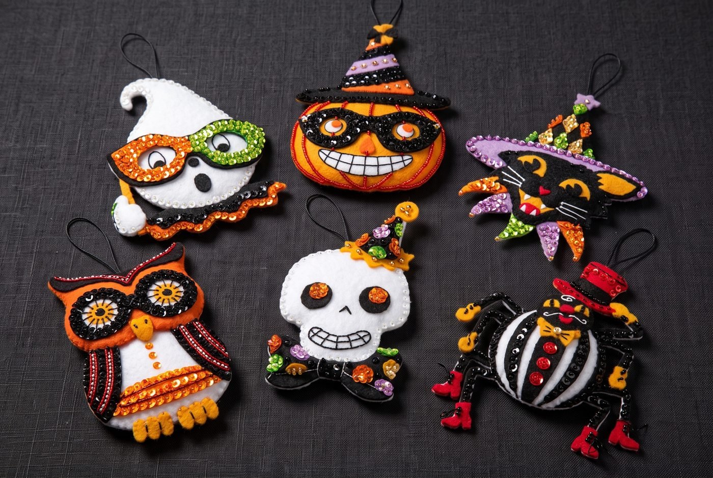 Bucilla Vintage Halloween felt ornament kit set of 6 (89276E) Vintage Halloween 89276E felt applique ornament set of 6 — ghost jack-o-lantern owl skull cat and spider with retro masquerade aesthetic