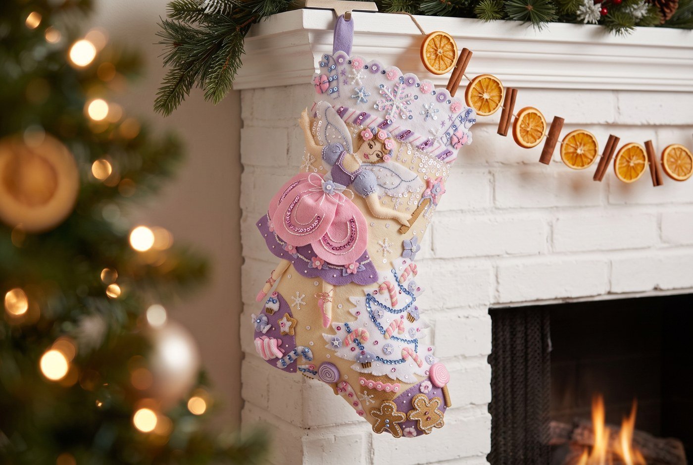 Bucilla Sugar Plum Dreams felt-applique stocking 89629E — cream and lavender base with a sugar plum fairy ballerina in a purple tutu and wings, candy trees, and pastel sweets